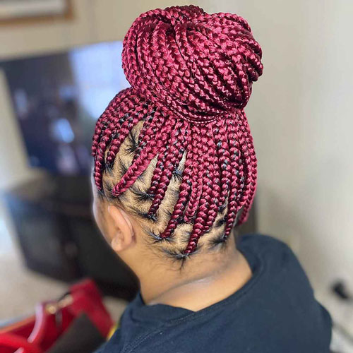 High-bun-with-burgundy-braid